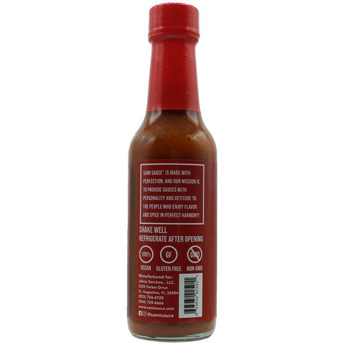 Back label of Sami Sauce Hot Sauce showing mission statement, vegan, gluten-free, and non-GMO icons