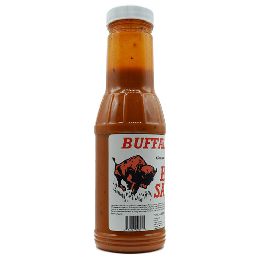 Buffalo Gill's Hot Sauce 12 oz bottle side label featuring charging buffalo illustration in red and black, ingredients list including aged red cayenne peppers and distilled vinegar, with UPC barcode, distributed by Buffalo Gill's LLC Baltimore MD
