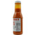 Buffalo Gill's Mild Sauce 12 oz bottle side view displaying the Nutrition Facts panel with 50 calories per 2 tablespoon serving, 16 servings per container, and 560mg sodium.
