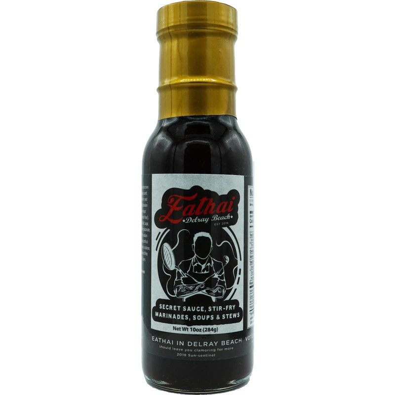 Eathai Secret Sauce Thai stir fry sauce bottle front label, authentic restaurant sauce from Delray Beach Florida