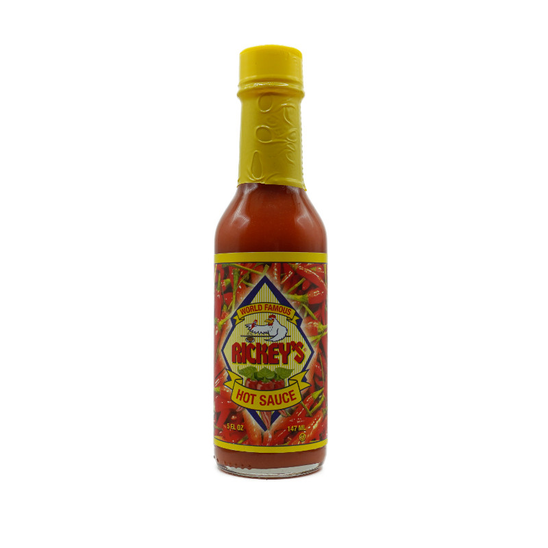 Bottle of Ricky’s World Famous Louisiana Hot Sauce, 5 fl oz, with vibrant yellow cap and eye-catching label featuring a rooster logo, ideal for enhancing chicken, seafood, and other dishes.