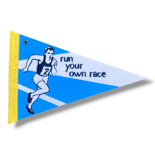vintage runner on small pennant with the slogan Run Your Own Race