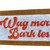 banner that says wag more bark less in kind of western vibe