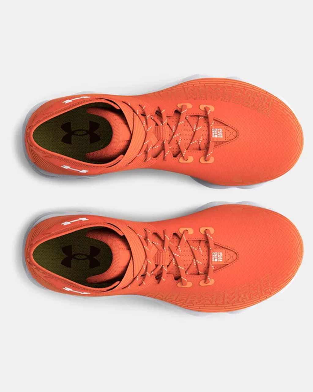 Under armour store cleats orange