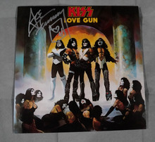 KISS Love Gun Tangerine Vinyl LP Signed by Ace Frehley