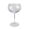A clear glass with a wide bowl and slender stem, designed for serving drinks.