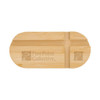 A bamboo phone stand featuring an engraved logo, with a smooth, natural finish and an oval shape.