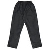 Black track pants with an elasticated waistband, featuring a loose fit and a smooth finish. Includes a branding logo.