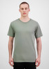 A short sleeve tee in a muted green colour, featuring a basic design and a logo on the front.
