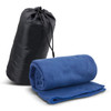A blue fleece blanket rolled up next to a black carry bag, featuring a drawstring closure.