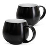 A drinkware set featuring two black coffee mugs with smooth finishes and white interiors. Each mug has a curved shape and handle.
