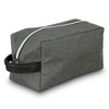 A toiletry bag in a textured gray fabric with a black leather handle and a white zipper.