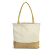 A natural tote bag with a cream upper section and a jute lower section, featuring long, tan handles.