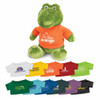A green crocodile plush toy wearing a bright orange shirt, surrounded by various miniature T-shirts in different colours.