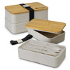 A stackable lunch box in a light beige colour with bamboo lid, featuring cutlery and a strap for secure closure.