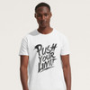 A white adult t-shirt featuring a bold graphic design with the phrase "Push Your Limit." The shirt has a branding logo.