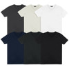 A selection of TRENDSWEAR Viva Men's T-Shirts in six colours: black, navy, dark grey, light grey, white, and cream.
