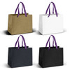 Medium ribbon handle paper bags in gold, white, and two shades of black, featuring purple handles.