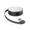 A USB hub in black and silver with two USB ports and a retractable cable. It features a circular design.