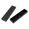 A black pen packaging box with a lid, featuring an interior ribbon for securing the contents.