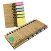A bamboo sticky note holder with multiple sticky flags in pink, green, and yellow, featuring a ruler on the front.