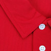 A red women's polo shirt featuring a collar and button placket, with a logo present.