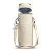 A cream cooler bag with a removable lid, featuring a shoulder strap and an inner lining for insulation.