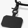 A black phone lanyard with a textured tag and a clip for attachment. It features a simple, minimalist design.