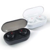 A pair of Tempest TWS earbuds in black and white, housed in a charging case with a transparent lid.