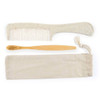 A beige toiletry bag containing a wooden toothbrush and a beige comb with a speckled design.