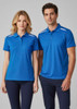A blue short sleeve polo shirt with white accents, displayed on a male and female model. Features a logo on the chest.