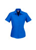 A blue short sleeve button-up shirt with a collar and a logo. The shirt features a tailored fit.