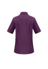 A purple overblouse with short sleeves and a collar, featuring a back yoke detail. It has a logo.