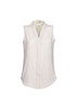 A sleeveless, light cream women's top with a v-neck and soft fabric. Features a branding logo.