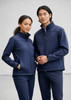 A navy blue softshell jacket featured on two models, one male and one female, both in matching outfits.