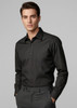 A black long sleeve button-up shirt on a model, featuring a fitted design and a logo on the chest.