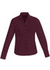 A burgundy women's long sleeve button-up shirt featuring a collar and a logo.