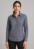 A women's long sleeve button-up shirt in a grey colour, featuring a collar and a logo.