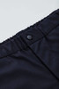 A close-up of black men's comfort waist cargo shorts featuring a button closure and elastic waistband.