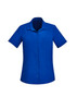 A short-sleeve women's shirt in vibrant blue with a button-up front and a pocket. It features a logo on the chest.