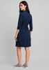 A navy blue women's dress with long sleeves and a tie waist, featuring a back view and a knee-length cut.