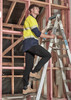 Lightweight black cargo pants worn by a man climbing a ladder in a building under construction.