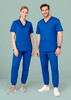 A man and woman wearing blue scrub tops and slim leg jogger scrub pants, with a logo present on the apparel.