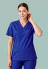 A reversible scrub top in royal blue featuring short sleeves and a front pocket, modelled by a person.
