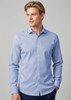 A tailored long sleeve shirt in light blue, featuring a button-up front and a collar, modelled by a man.