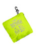 A bright yellow packable rain jacket compactly folded with a clip for easy attachment and a logo.