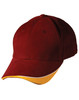 A maroon cap with a yellow curved peak, featuring stitching details and ventilation holes. It has a logo on the front.