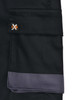 A pair of black unisex cargo shorts features multiple pockets and a grey band, with a logo on the side.