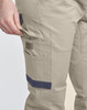 Unisex cotton stretch drill cuffed work pants in khaki with a side pocket and navy detailing.