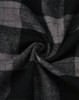 A close-up of black and grey flannel fabric featuring a plaid pattern, showcasing the texture and design.